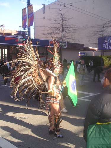 brazil dating woman. Woman with Brazil flag dressed up at the very end of the holding area of the 