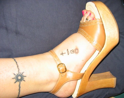 Tribal sun ankle band and Egyptian Hieroglyphic. 