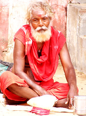 Mendicant outside the Kizhaperumpallam temple