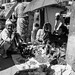 sharing news in the Ilam bazaar