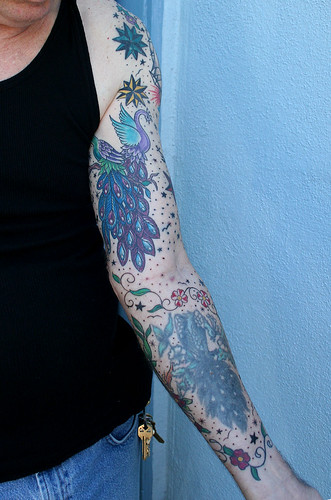 Tattoo San Pedro California Old Peacock on lower arm 