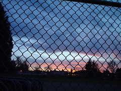 Chain link and sunset (by zak_greant)