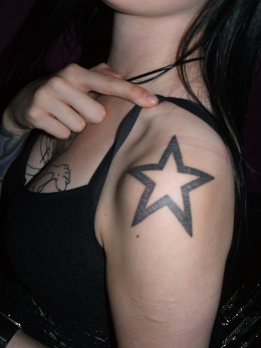 star tattoo on forearm. anabelle star tattoo left arm