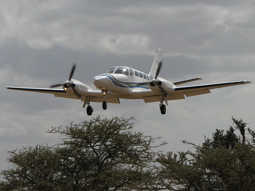 Plane landing at Serengeti National Park airstrip