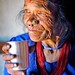 old tamang woman drinking tea