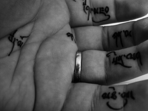 finger tattoos words