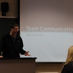 Student Kevin Guzak presents a lecture to his class titled Team Communication.