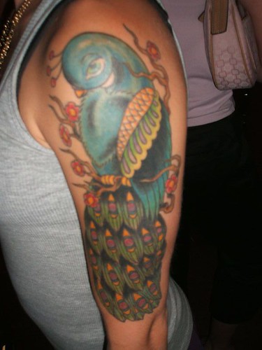 parrot tattoo. Parrot Tattoo
