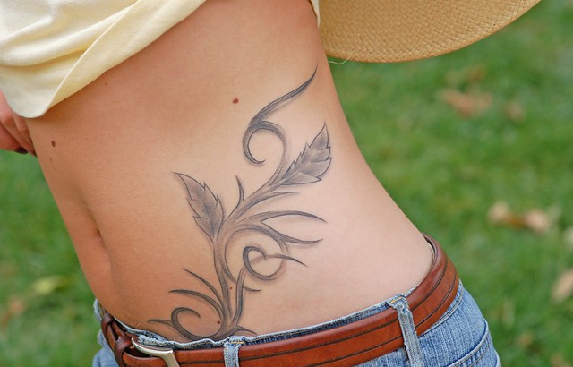 And this a a fantastic detail of her tattoo: wild wild west.