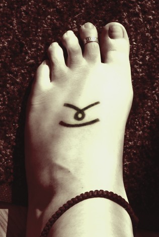 Tattoo on the top of my left foot.My and my best friend got them when we 