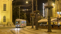 An old tram approaching infront of Protestant Great Church of Debrecen, Hungary with Lumix DMC-GX7