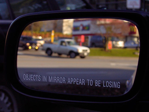 Objects in mirror appear to be losing