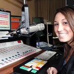 A student in the Titan Radio production room