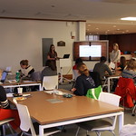 Students learn writing skills in the library.