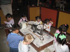 Chaos at the sand table (Discovery Museum)