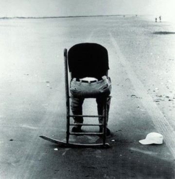 Man in empty chair