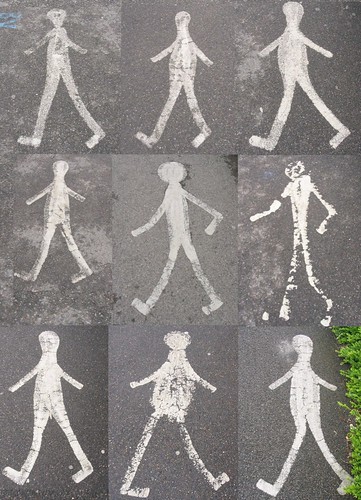 graffiti of stick figure walking, nine different figures in a square, some walking in the opposite direction