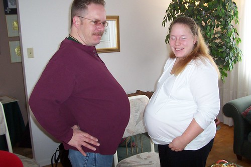 A pot-bellied man and his pregnant niece