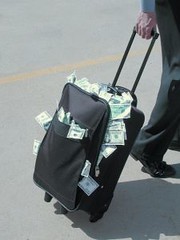616473_suitcase_full_of_money
