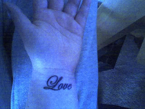 wrist word tattoo photo