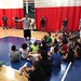 Tyler Nelson stops by to talk to the kids of NE Hoops Academy.