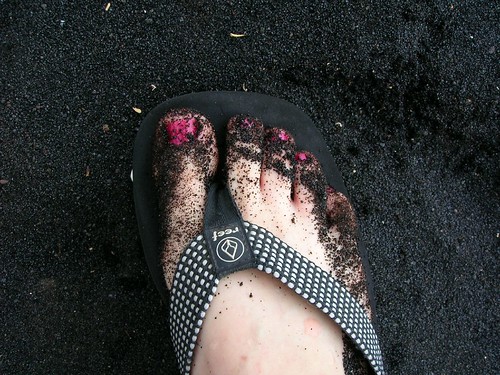 my black-sand covered toes