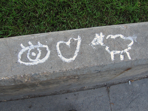 pictograph graffiti -- an eye, a heart, and a female sheep (eye love ewe)