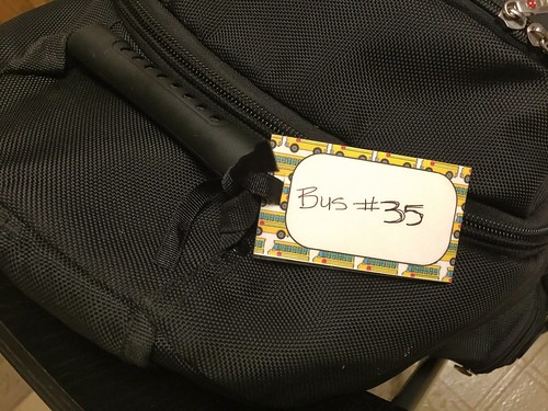 tie in place backpack tags