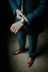 black suit and watch businessman credit to https://1dayreview.com