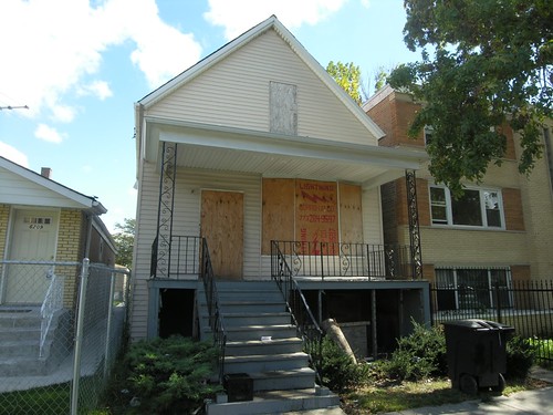 Boarded-up home, 6000 block, S Artesian Ave