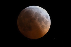 lunar eclipse with star