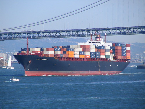 container ship leaving bay area