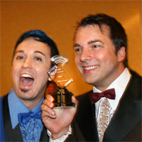 Fausto and Marc accept the People's Choice Podcast Award