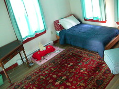 Aryaloka solitary cabin bedroom