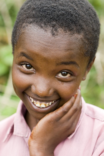 Smiling Girl on Mount Meru by DavidDennisPhotos.com