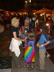 Hill Tribe woman gives the family the shakedown at the night Market