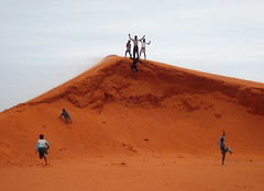 Kids on a manmade dune