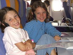 Anna and Caleb on the flight to Bangkok