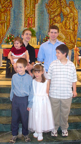 Izzy and her siblings at first communion