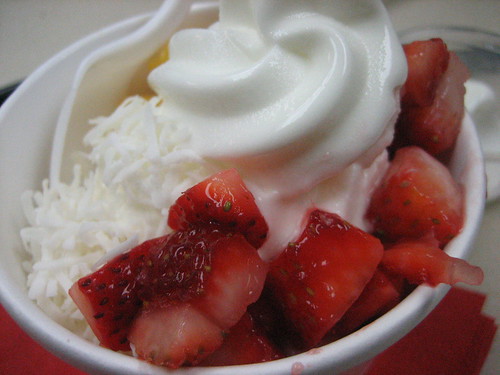 Yogurt with coconut, strawberries and mango Yumm!