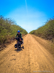 Riding on a less crappy dirt road, near La Alina, Cuba.