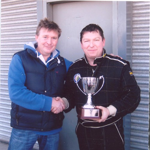 Simon Griffiths presents Neil Smith with the Kevin Griffiths trophy at Donington in 2012.