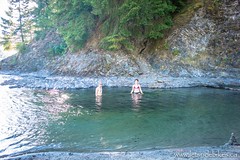 Andrew and Carley going for a dip in the glacier-fed waters of the Coquihalla River.