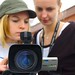 Girls holding camera