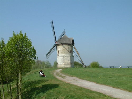 Windmill on a hilltop from behind
