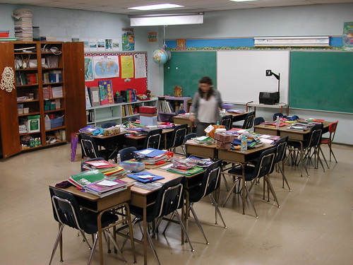 Blur of teacher in classroom from http://www.flickr.com/photos/editor/72550972/