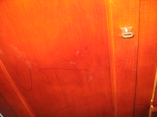 Permanent Marker on Armoire
