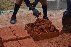 Making earth bricks, Gone Rural BoMake, March 2015
