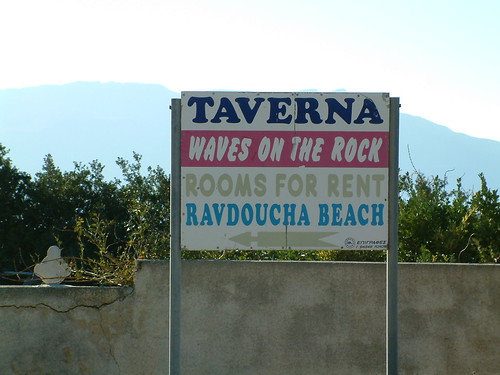 Waves on the rock sign
