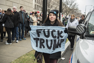 Fuck Trump - A Protester Holds a Sign Outside the Presidential Inauguration of Donald Trump